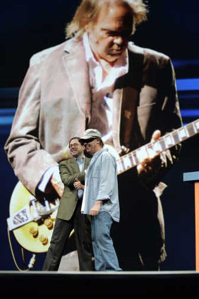
Neil Young joins Sun Microsystems CEO Jonathan Schwartz onstage Tuesday at Sun's JavaOne Conference in San Francisco. Associated Press
 (Associated Press / The Spokesman-Review)