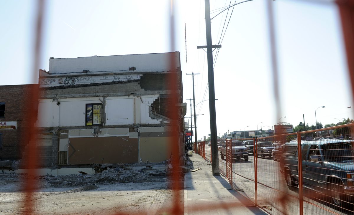 The buildings on the southwest corner of Sprague Avenue and Pines Road are being demolished to create space for a  Rite Aid store. (Jesse Tinsley / The Spokesman-Review)