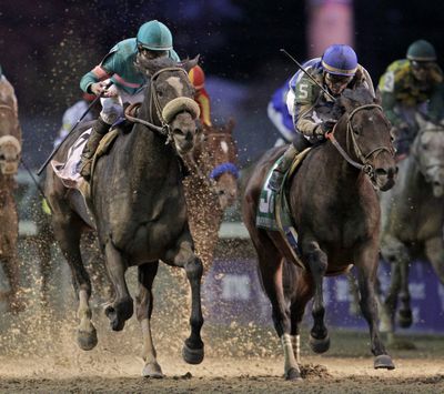 Zenyatta, left, lost to Blame, right, in the Breeders’ Cup, but not in Eclipse voting announced Monday. (Associated Press)