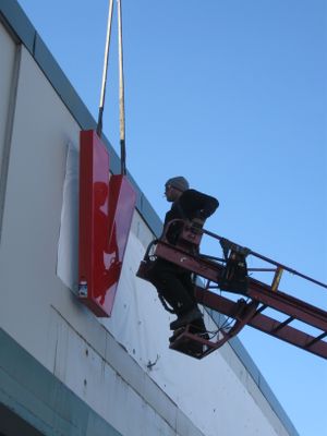 Some sign work is being done at the Vallue Village at Sprague and McDonald on Dec. 21, 2010. (Lisa Leinberger)