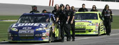 
Jimmie Johnson's car, left,  will attempt to qualify at Daytona today on Fox. Associated Press
 (Associated Press / The Spokesman-Review)
