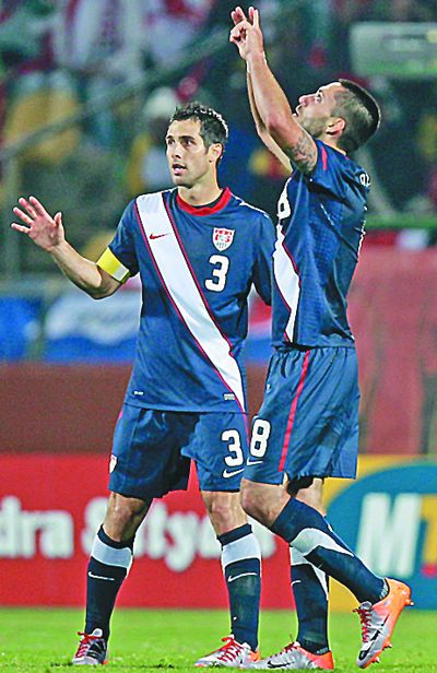 Americans Clint Dempsey, right, and team captain Carlos Bocanegra don’t have to worry about the different scenarios that would allow them to advance if they beat Algeria in the U.S.’ final Group C match in Pretoria, South Africa, this morning. (Associated Press)