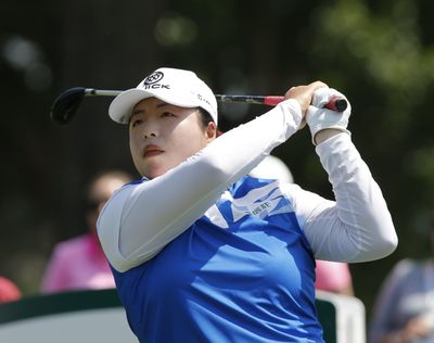 In this May 20, 2017 file photo, Shanshan Feng, of China, watches her tee shot on the second hole during the third round of the Kingsmill Championship LPGA golf tournament in Williamsburg, Va. (Steve Helber / Associated Press)