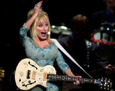 
Dolly Parton performs at the Spokane Arena Saturday night. 
 (Amanda Smith / The Spokesman-Review)