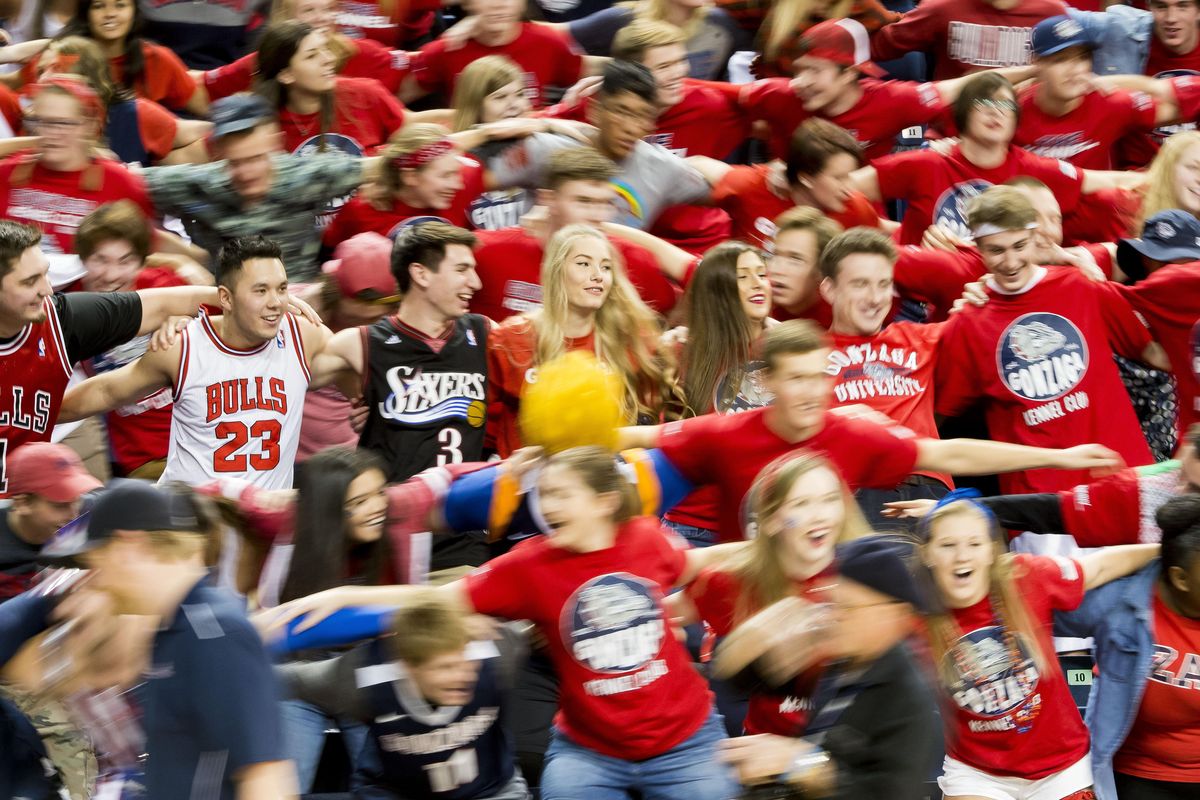 Gonzaga fans link arms before the game with Bryant, Friday, Nov. 18, 2016, at the McCarthey Athletic Center. (Colin Mulvany / The Spokesman-Review)