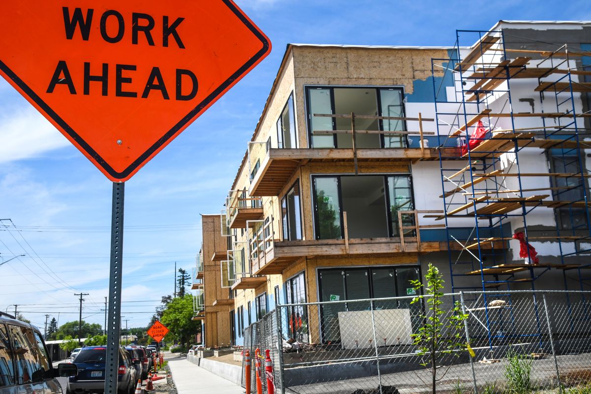 The College Avenue Apartments in Spokane. Spokane County’s population has passed the half-million mark, fueling new construction and housing prices. (Dan Pelle / The Spokesman-Review)