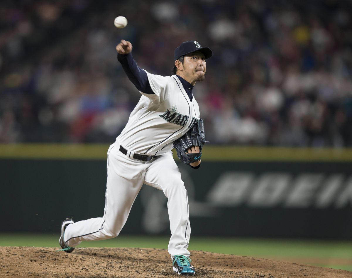 M’s starter Hisashi Iwakuma recorded six strikeouts in eight innings in 5-0 win. (Associated Press)