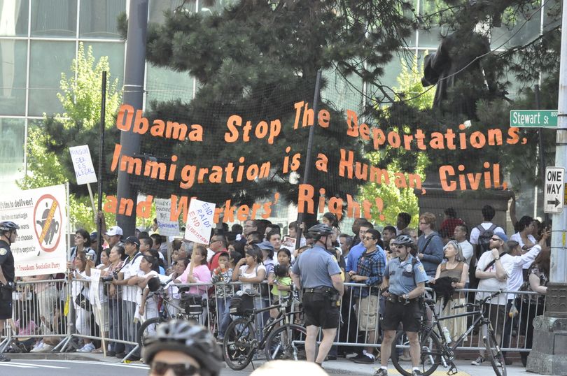 Demonstrators outside the Westin Hotel for President Obama's visit to Seattle on Aug. 17, 2010