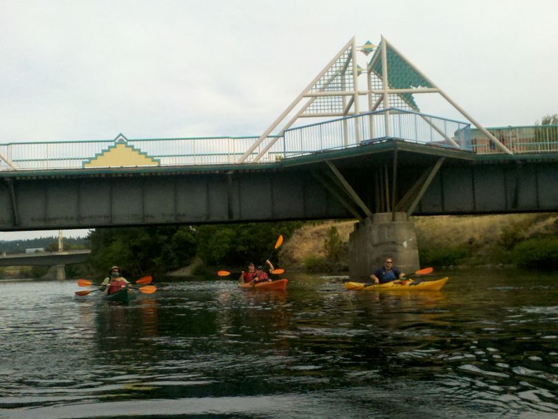 A group of kayakers float down the Spokane River, one of several hands-on presentations the Spokane River Forum has created to educate the community about the value of the river. Rather than present traditional lectures, the forum invites people to travel down stretches of the river. (Courtesy Spokane River Forum)