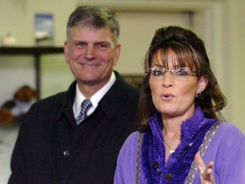 Former governor of Alaska and vice presidential candidate Sarah Palin arrives at the Asheville, N.C. airport on Sunday afternoon Nov. 22, 2009, for a visit with the Graham family. At left is Franklin Graham, who was there to meet her at the airport. (Stephen Miller / The Citizen-times)