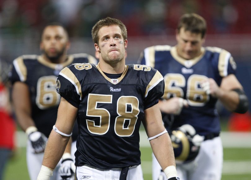 FILE - In this Sept. 27, 2009, file photo, St. Louis Rams linebacker David Vobora leaves the field after the fourth quarter of an NFL football game against the Green Bay Packers in St. Louis.  
