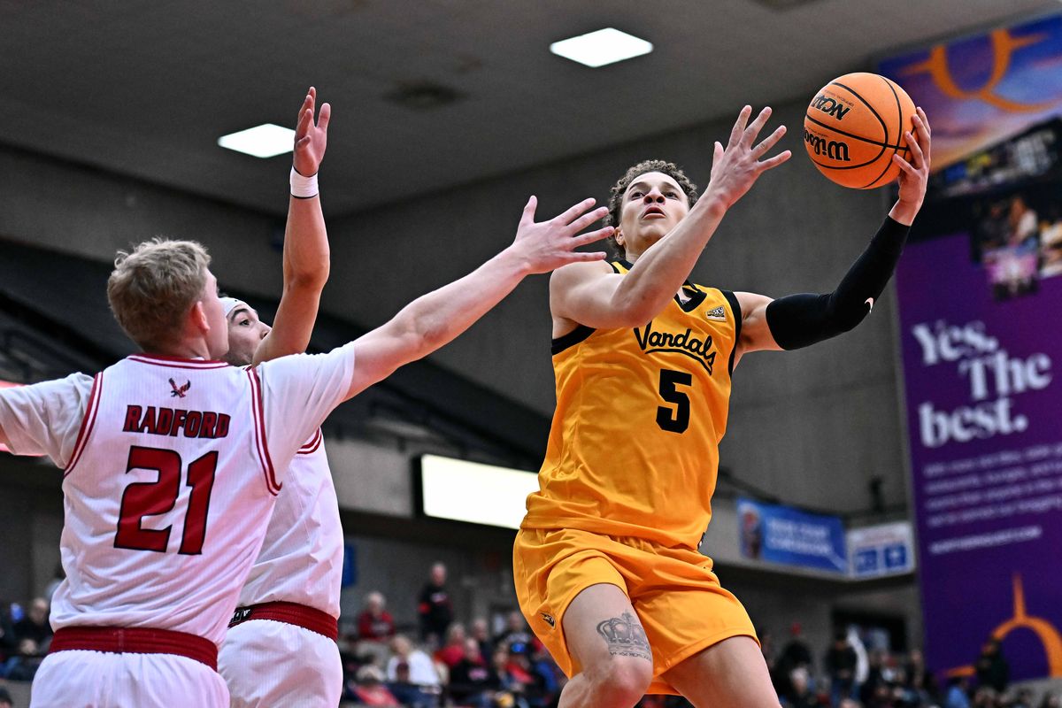 Idaho Vandals guard Isaiah Brickner (5) shoots against Eastern Washington Eagles guard Johnny Radford (21) in the first half of a Big Sky men’s basketball game on Monday, March 2, 2026, at Reese Court in Cheney, WA. (James Snook/For The Spokesman-Review)