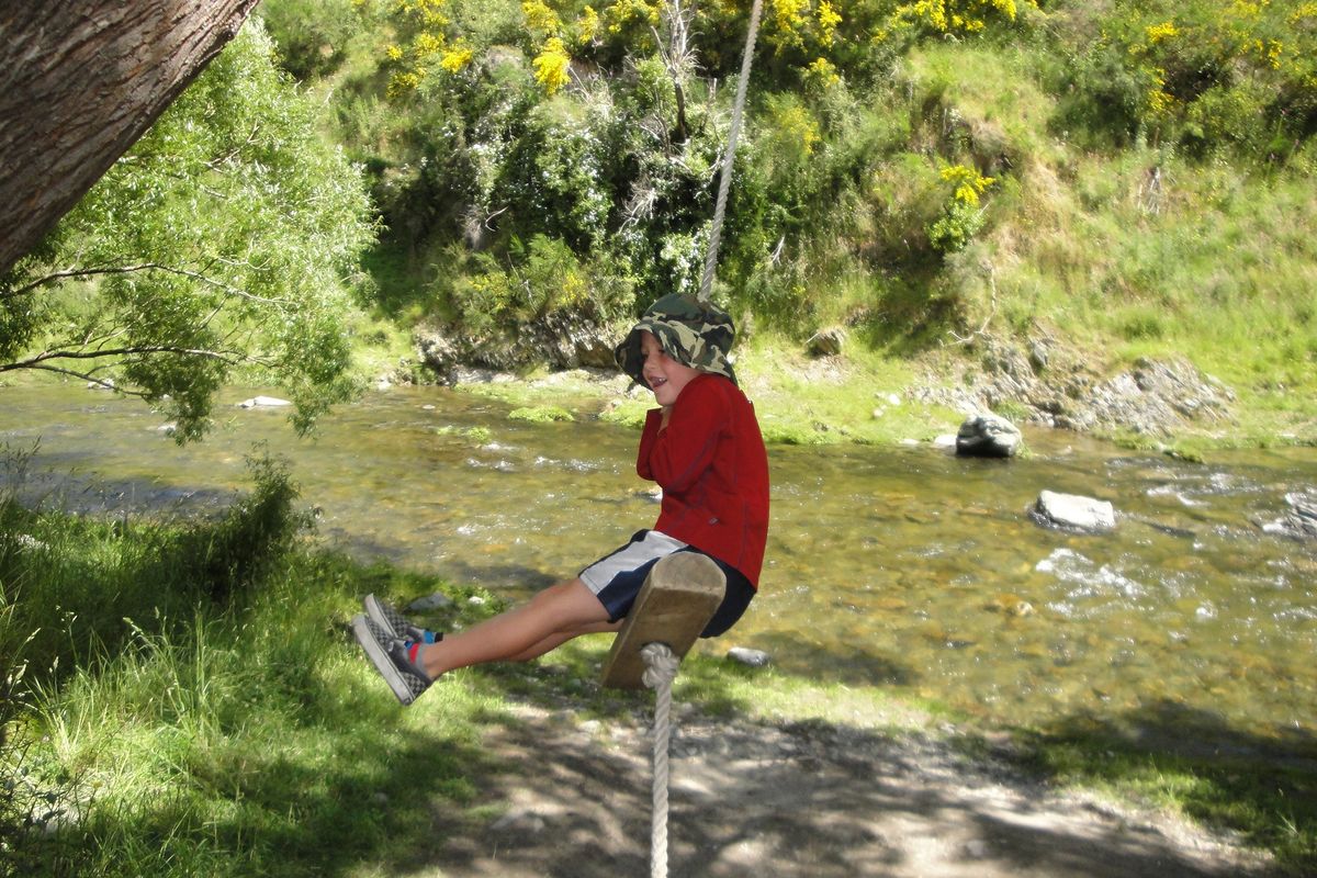 Finley Stanelun rides the rope swing at Dansey’s Pass Holiday Park in New Zealand. (Dawn Picken)
