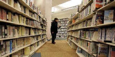 Libraries like this one in Cleveland are investing more money in DVDs and videos, and many people say they are turning to libraries for free movies and bypassing stores.
(Associated Press / The Spokesman-Review)