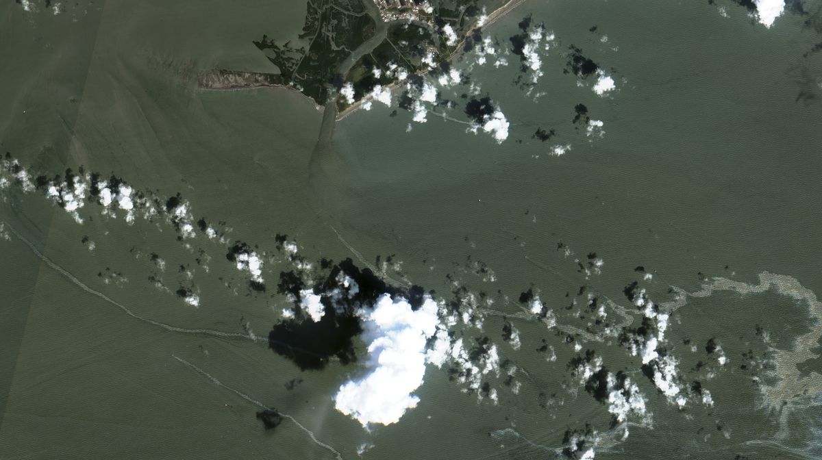 In a satellite image provided by Maxar Technologies, an oil slick is shown on Sept. 2, 2021 south of Port Fourchon, La. The U.S. Coast Guard said Saturday, Sept. 4, that cleanup crews are responding to a sizable oil spill in the Gulf of Mexico following Hurricane Ida.  (HONS)