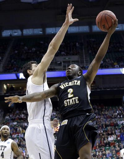 Malcolm Armstead, right, transferred from Oregon to Wichita State, which didn’t have a scholarship for him. (Associated Press)