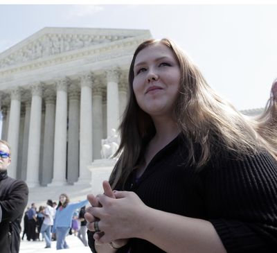 ORG XMIT: NY118 FILE - This April 21, 2009, file photo shows Savana Redding  standing outside the Supreme Court in Washington, after the court heard the  case of Redding who was strip searched when she was 13 years old by school officials looking for prescription-strength ibuprofen pills . The court ruled Thursday, June 25, 2009, that the school's strip search  was illegal. In an 8-1 ruling, the justices said school officials violated the law with their search of  Redding in the rural eastern Arizona town of Safford.  (AP Photo/Evan Vucci, file) (Evan Vucci / The Spokesman-Review)
