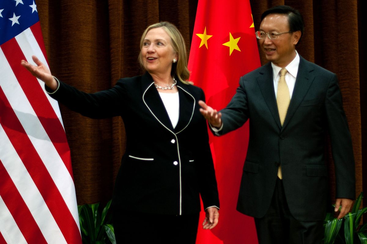 U.S. Secretary of State Hillary Rodham Clinton, left, meets with Chinese Foreign Minister Yang Jiechi, at the Ministry of Foreign Affairs in Beijing Tuesday, Sept. 4, 2012.  Clinton is in Beijing to press Chinese authorities to agree to peacefully resolve disputes with their smaller neighbors over competing territorial claims in the South China Sea. (Jim Watson / Afp Pool)