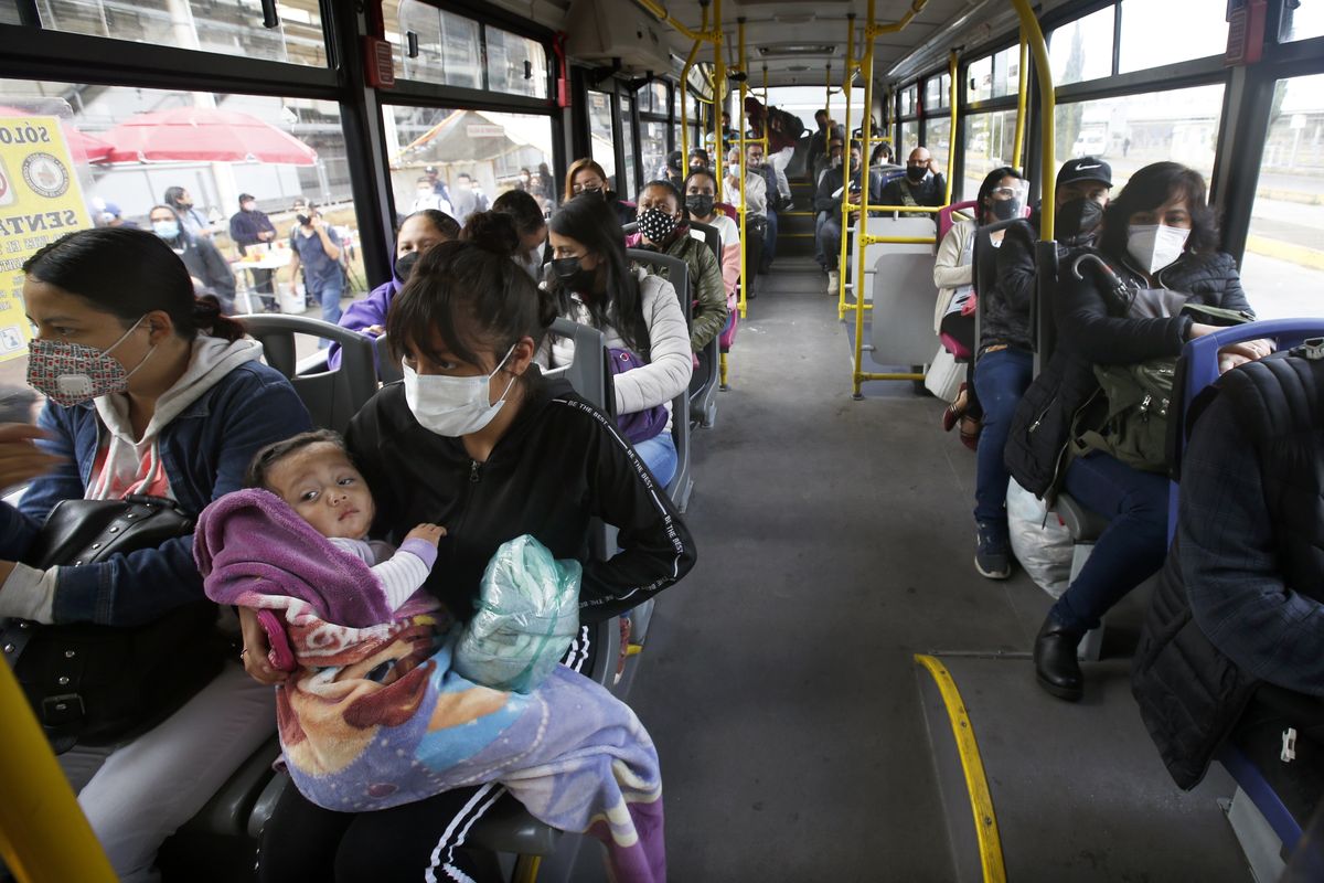 Left without subway service on Line 12 after Monday’s collapse, commuters ride a bus on the south side of Mexico City, Thursday, May 6, 2021. At its farthest point, Line 12 carries commuters from the capital’s still semi-rural south side to jobs across the city. Some 220,000 riders use Line 12 every day.  (Marco Ugarte)
