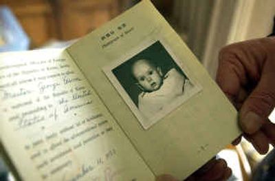 
The passport Keenan used as an infant. 
 (Brian Plonka / The Spokesman-Review)