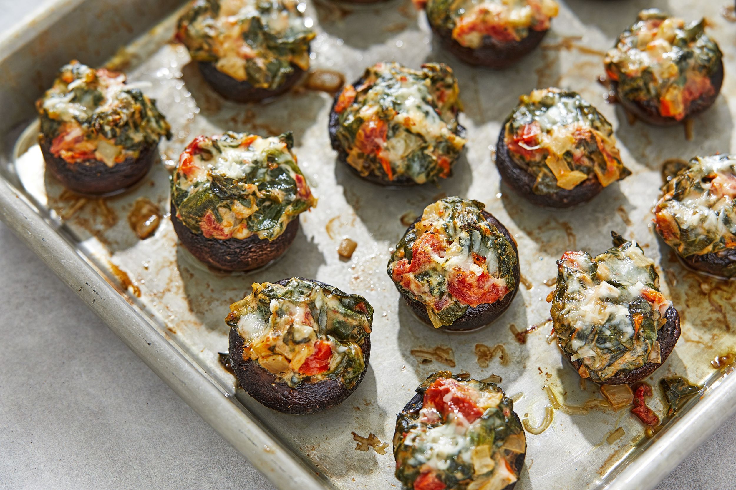 Spinach and cheese stuffed mushrooms make buzzworthy party fare The