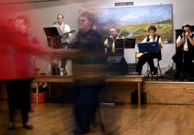 
People move to the music of the Country Jammers. There is a dance at the Grange the first and third Sundays of the month.
 (The Spokesman-Review)