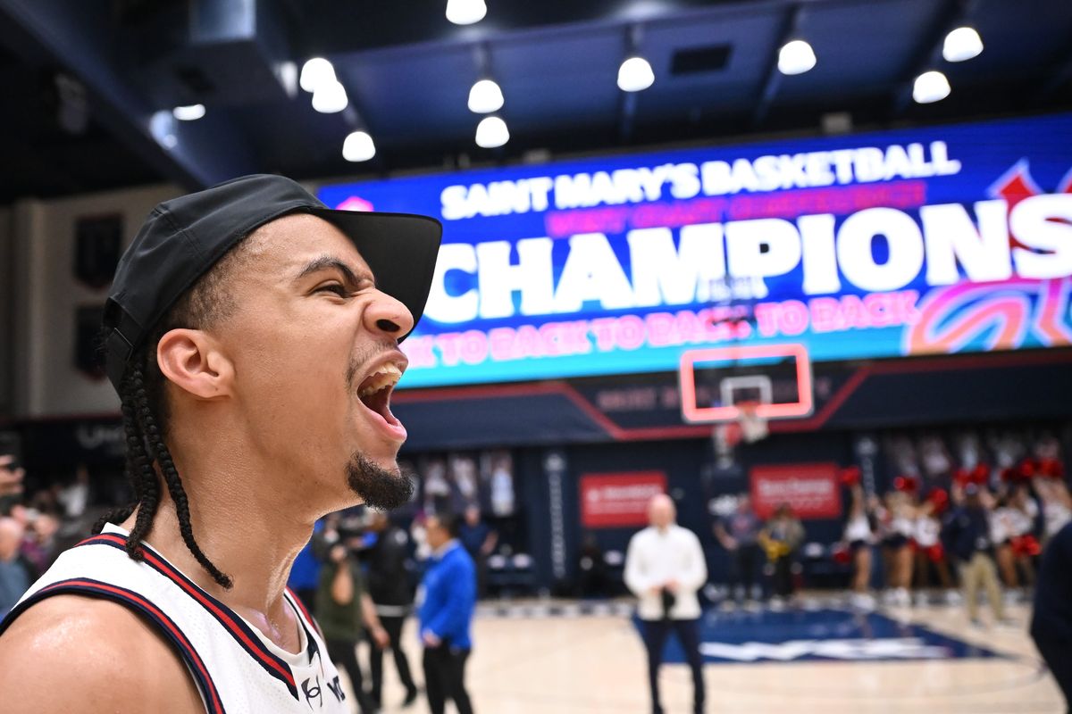 Saint Mary’s guard Mikey Lewis cheers after beating Gonzaga to win a share of the WCC regular-season title on Saturday at UCU Pavilion in Moraga, Calif.  (Tyler Tjomsland/The Spokesman-Review)