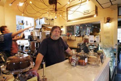 
Robert Thompson poses for a photograph at his Fair Grinds Coffee House in New Orleans. The coffeehouse just opened in June after undergoing repairs from Hurricane Katrina. Two years after Hurricane Katrina devastated the Gulf Coast, many small-business owners are still recovering. Others have found sources of revenue because of the widespread physical and economic rebuilding that will be going on for years. Associated Press
 (Associated Press / The Spokesman-Review)