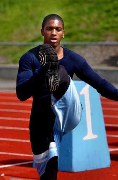 
Tasheen Garry of the Central Valley Bears warms up on the track. 
 (Steve Thompson/Spokesman Review / The Spokesman-Review)
