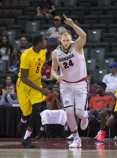 Gonzaga Bulldogs center Przemek Karnowski (24) celebrates scoring two points over Iowa State Cyclones forward Merrill Holden (5) during the first half of an NCAA college basketball game at the Advocare Invitational tournament, in Lake Buena Vista, Fla., Sunday, Nov. 27, 2016. (Willie J. Allen Jr. / Associated Press)