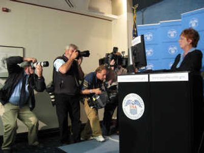 
Kathleen Casey-Kirschling files for Social Security benefits online  Monday at the National Press Club in Washington. Associated Press
 (Associated Press / The Spokesman-Review)