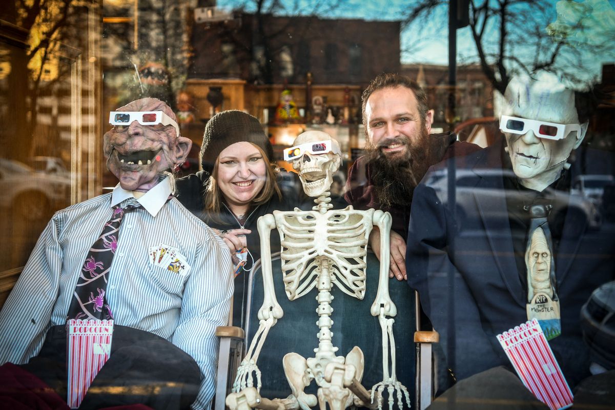 Samantha Fetters, owner of Petunia & Loomis and manager Jesse McCauley gather in the front window of the business at 421 W. Riverside Ave. They describe it as an oddities shop that offers everything from dolls to animals skulls to antiques.  (DAN PELLE/THE SPOKESMAN-REVIEW)