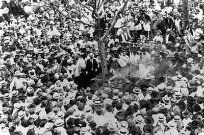 
In this photo provided by The Texas Collection at Baylor University in Waco, Texas, thousands of people gather in Waco in 1916 to watch the lynching of a black teenager. 
 (Associated Press / The Spokesman-Review)