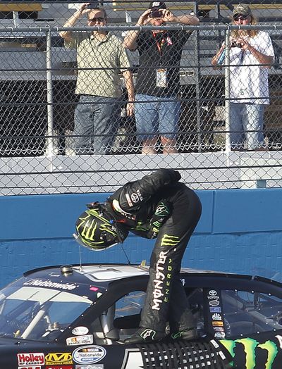 Kyle Busch takes a bow in front after winning at Phoenix International for his 52nd career Nationwide victory. (Associated Press)