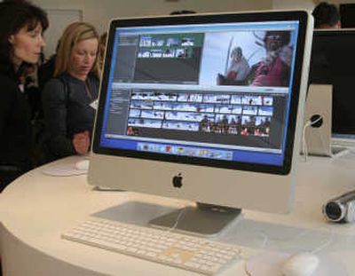 
Apple Inc. updated its iMac computers Tuesday with a slimmer design, faster chips and glossy screens, hoping to further propel sales that already outpace the rest of the PC industry. Associated Press
 (Associated Press / The Spokesman-Review)