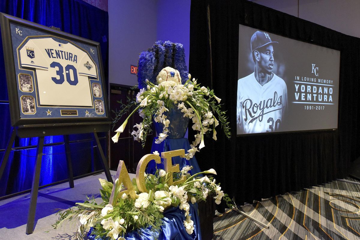 Flowers, images and a jersey are among the items at the front of the room where Kansas City Royals’ Yordano Ventura was remembered by members and employees of the team in Kansas City, Mo. Ventura died in a car crash in the Dominican Republic. (John Sleezer / Kansas City Star via AP)