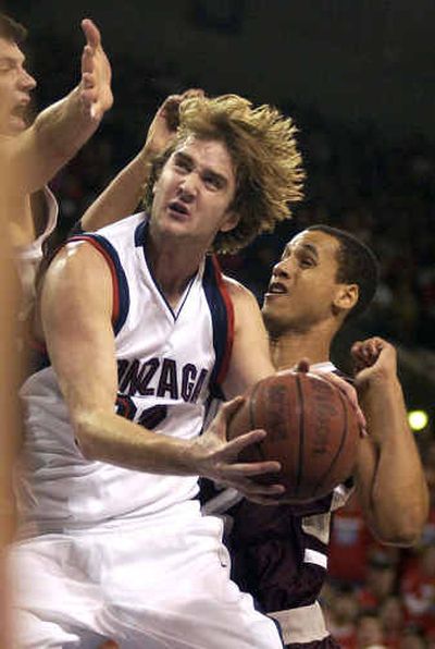
Gonzaga sophomore Sean Mallon drives for the basket during first-half action at the Arena on Sunday.
 (J. Bart Rayniak/ / The Spokesman-Review)