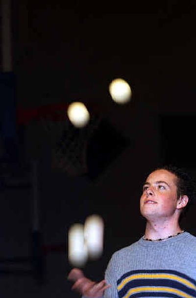 
Troy Anast, a junior at Timberlake High School, is an avid juggler who would like to add knives and lighted torches to his act. 
 (Kathy Plonka / The Spokesman-Review)