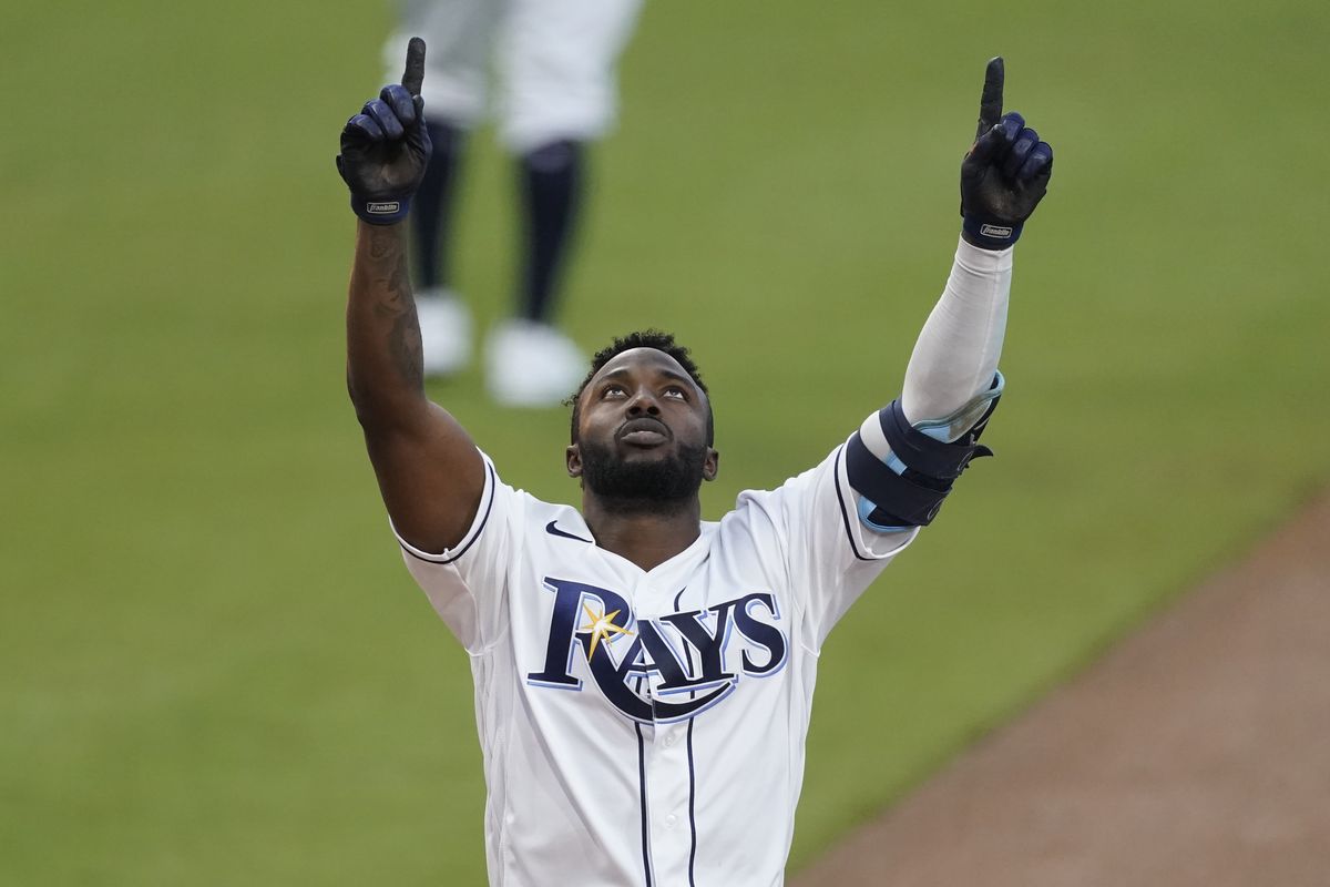 Tampa Bay’s Randy Arozarena, who set a rookie record with his seventh home run of the postseason, celebrates Saturday after hitting a two-run homer against Houston in the first inning of Game 7 of the American League Championship Series in San Diego.  (Associated Press)