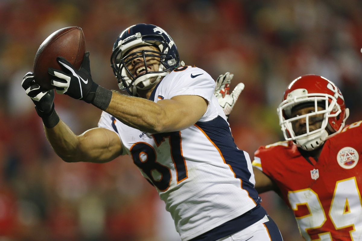 Broncos wide receiver Eric Decker makes one of his four touchdown catches as Chiefs cornerback Brandon Flowers defends. (Associated Press)