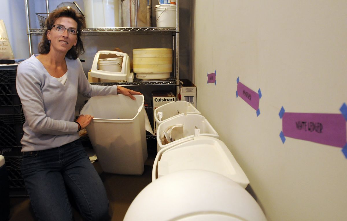 Crissy Trask, who works from home as an author, shows how she organizes her paper recycling, which she hauls away once a year. She will be a presenter at the upcoming Bioneers Conference.  (Photos by JESSE TINSLEY / The Spokesman-Review)
