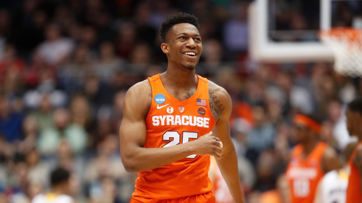 In this March 14, 2018 photo, Syracuse's Tyus Battle reacts during the first half of a First Four game of the NCAA men's college basketball tournament against Arizona State in Dayton, Ohio. Battle is among the players seeking to test their NBA draft stock before deciding whether to stay in school. College players had until Sunday, April 22, 2018 to declare early for the NBA draft. Players who havent hired an agent can withdraw by May 30 to preserve their college eligibility. (AP Photo/John Minchillo) ORG XMIT: NYPS202 (John Minchillo / AP)