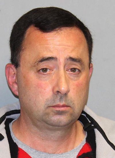 This Nov. 21, 2016 file photo provided by the Michigan Attorney General’s office shows former USA Gymnastics team doctor Larry Nassar. Nassar, who has been accused of sexually abusing gymnasts, was hit with a new lawsuit filed in federal court in western Michigan on Tuesday, Jan. 10, 2017, by 18 women and girls who say they were molested by him, mostly at his clinic at Michigan State University. (Michigan Attorney General’s office via AP)