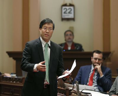 In this May 22 photo, State Sen. Richard Pan, D-Sacramento, left, calls on lawmakers to approve his measure to toughen the rules for vaccination exemptions in Sacramento, Calif. (Rich Pedroncelli / Associated Press)