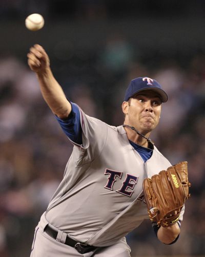 Rangers starter Colby Lewis allowed four hits in 8 2/3 innings. (Associated Press)