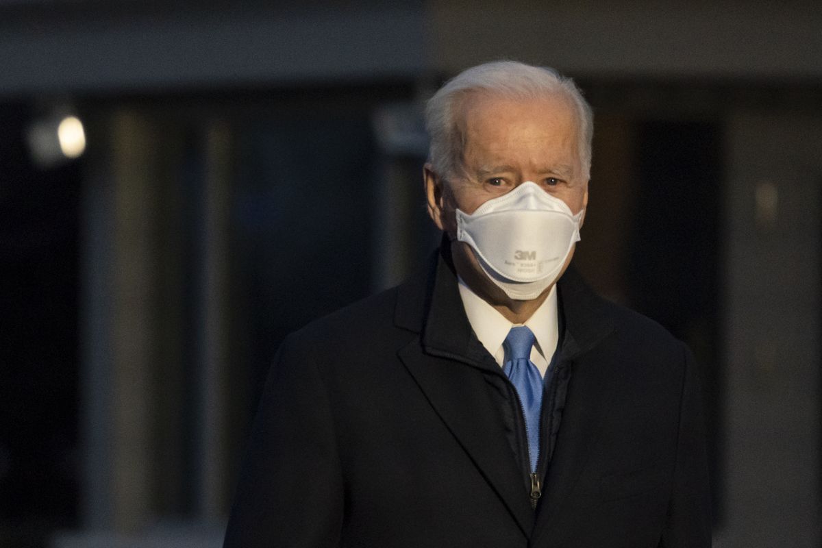 President Joe Biden pauses to speak with reporters as he walks to Marine One for departure from the South Lawn of the White House, Friday, Feb. 12, 2021, in Washington. Biden is en route to Camp David.  (Alex Brandon)