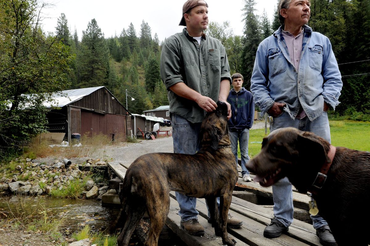 Residents who live along the east fork of Moon Creek – from left, Israel Provo, Tyler Provo and Harry Sommers – talk Thursday about the vast improvements in the water quality after the cleanup of the Silver Crescent Mine near Kellogg. 