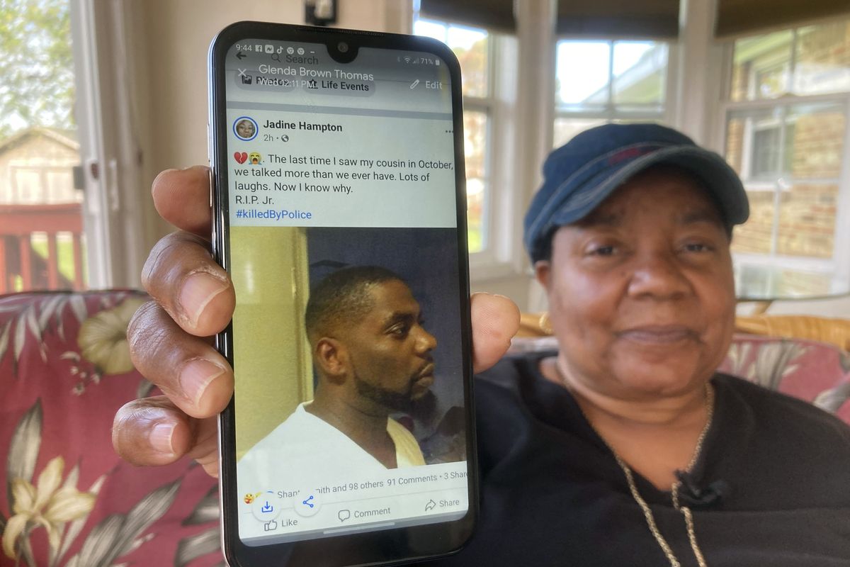 Glenda Brown Thomas displays a photo of her nephew, Andrew Brown Jr., on her cell phone at her home in Elizabeth City, N.C., on Thursday, April 22, 2021. Brown was shot and killed Wednesday by a sheriff's deputy, who was attempting to execute a warrant.  (Allen G. Breed)