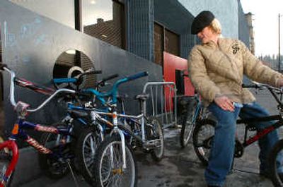 
Tim Bordwell, a GED student at Crosswalk in Spokane,  got first pick from a group of  bicycles from Pedals 2 People, a group that refurbishes bikes to encourage people to use them. The program supplied nine bikes to the teen program Thursday afternoon. 
 (Jesse Tinsley / The Spokesman-Review)