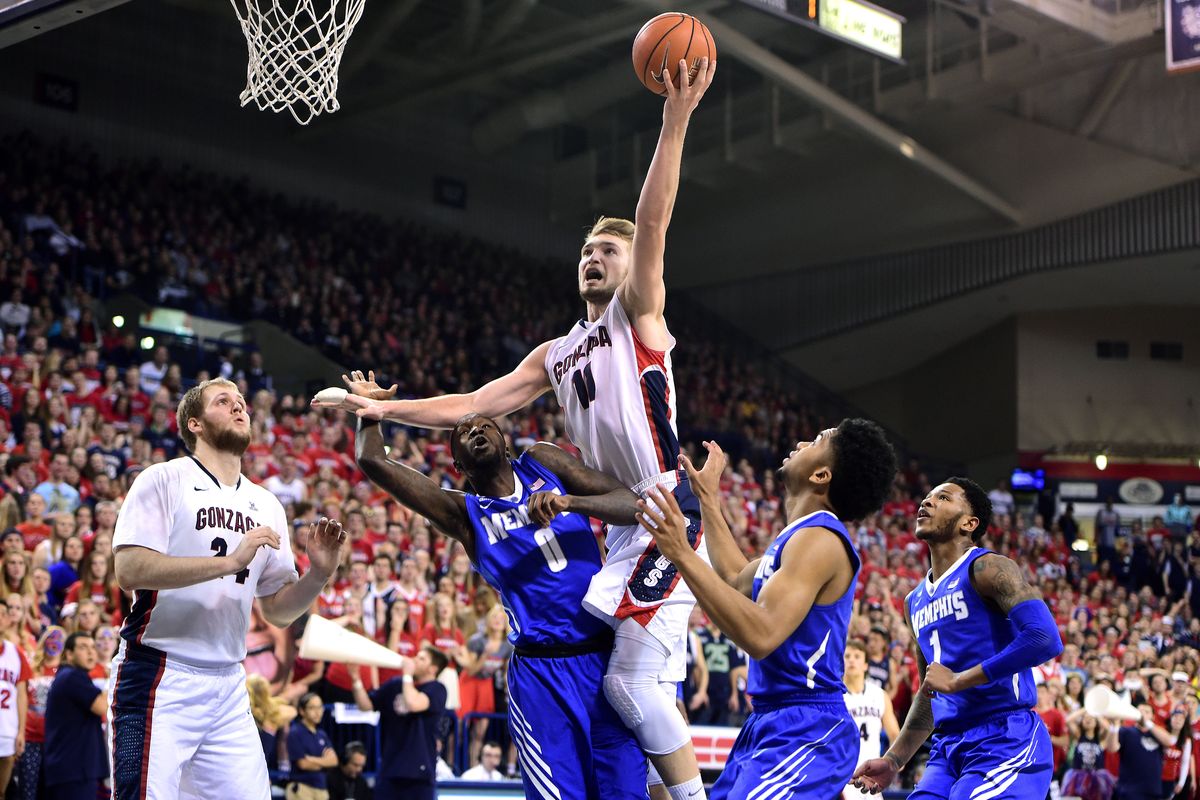 A trio of Tigers couldn’t keep Bulldogs forward Domantas Sabonis from scoring in the first half on Saturday. (Tyler Tjomsland)